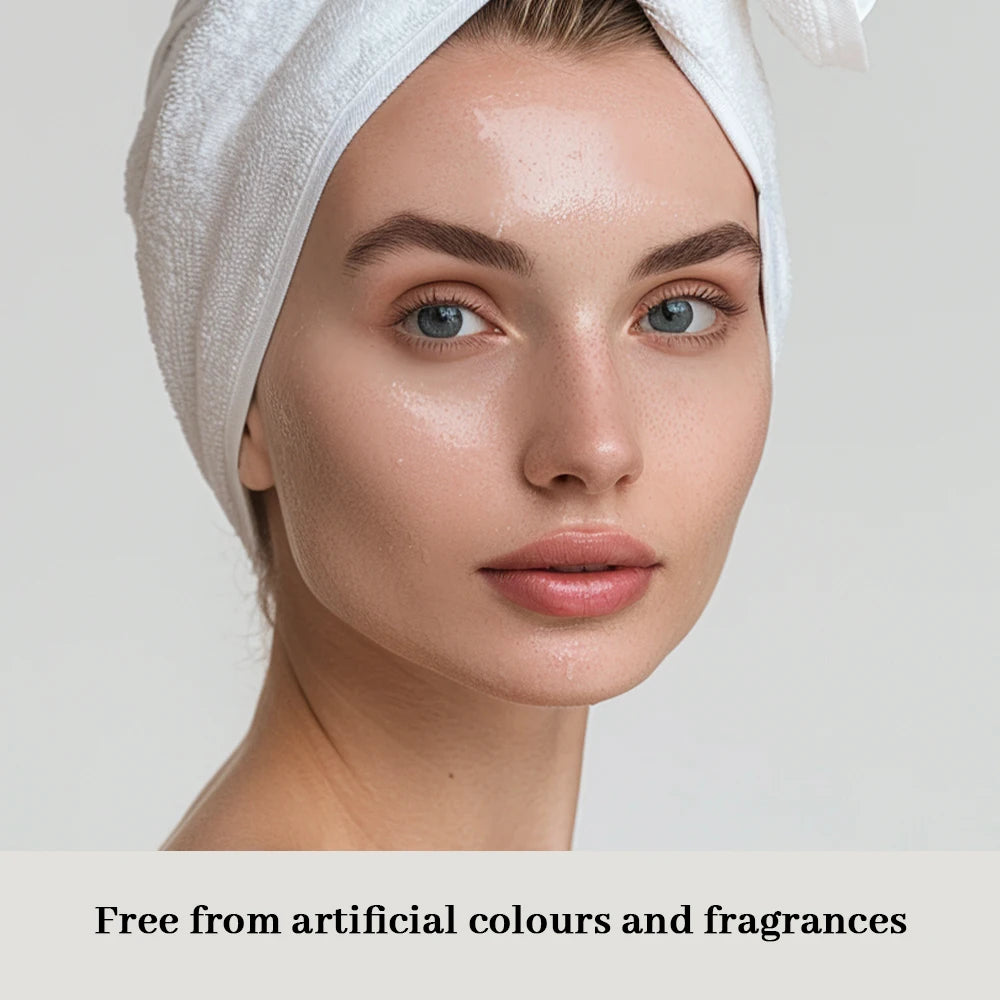 Model showcasing her clear skin after using acne treatment cream, free from artificial colors and fragrances