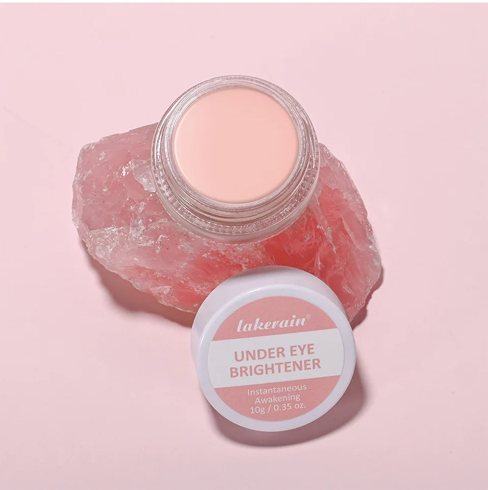 Lakerain Under Eye Brightener in a pink jar, promoting instant brightness and awakening for tired eyes