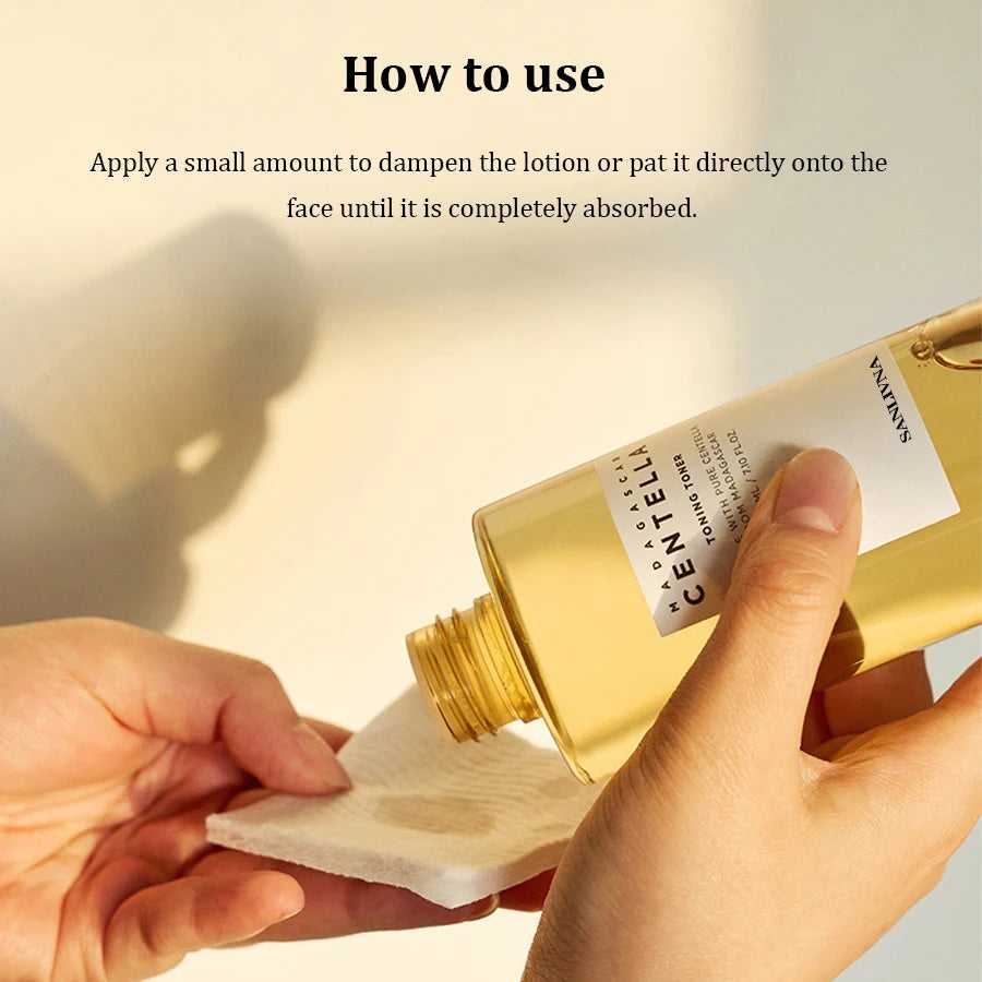 SANENDI Cleansers Centella Lotion Being Applied to Cotton Pad for Skincare Routine