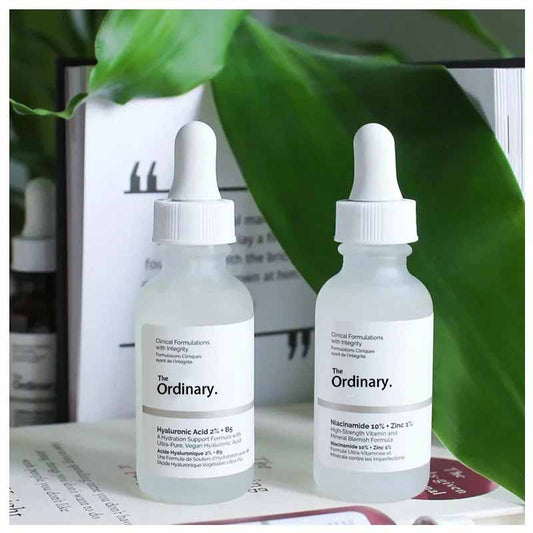 The Ordinary Hydrating Hyaluronic Acid Serum and Niacinamide Bottles on a Stylish Display