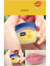 WNP'L Honey Lip Therapy Balm in a clear container with a blue lid for hydrated, soft lips