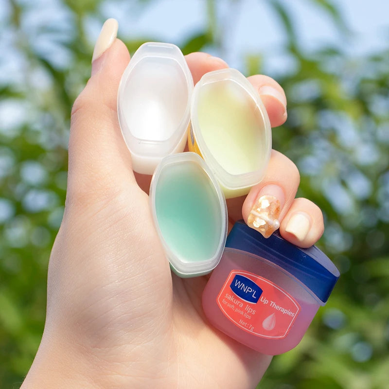 WNP'L Lip Treatment Set with Four Flavors in Portable Containers for Smooth, Hydrated Lips